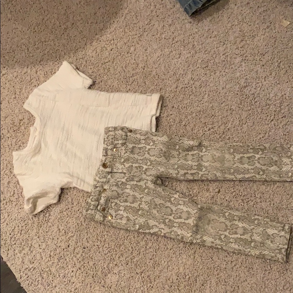 Short sleeve white shirt with snake skin jeans